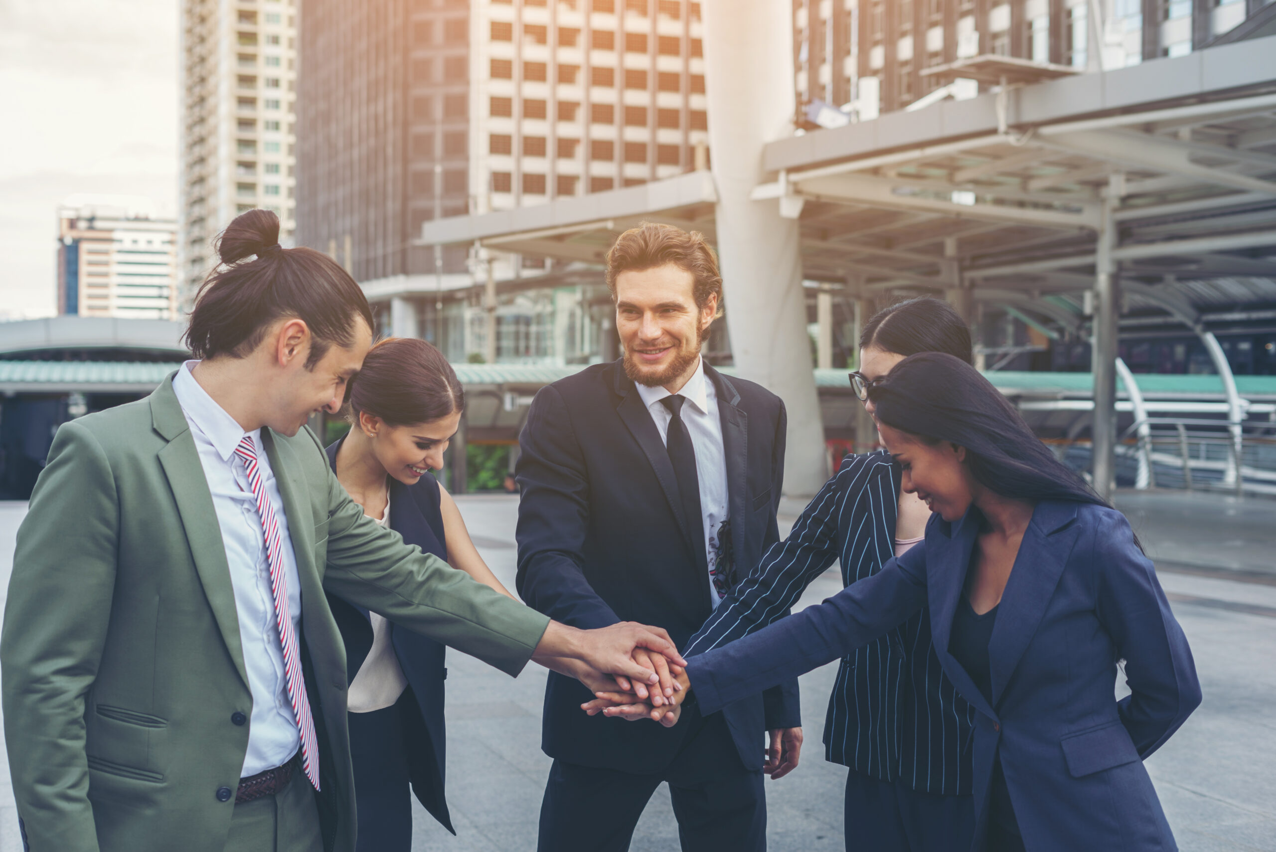 Close up of business people hands together. Teamwork concept.