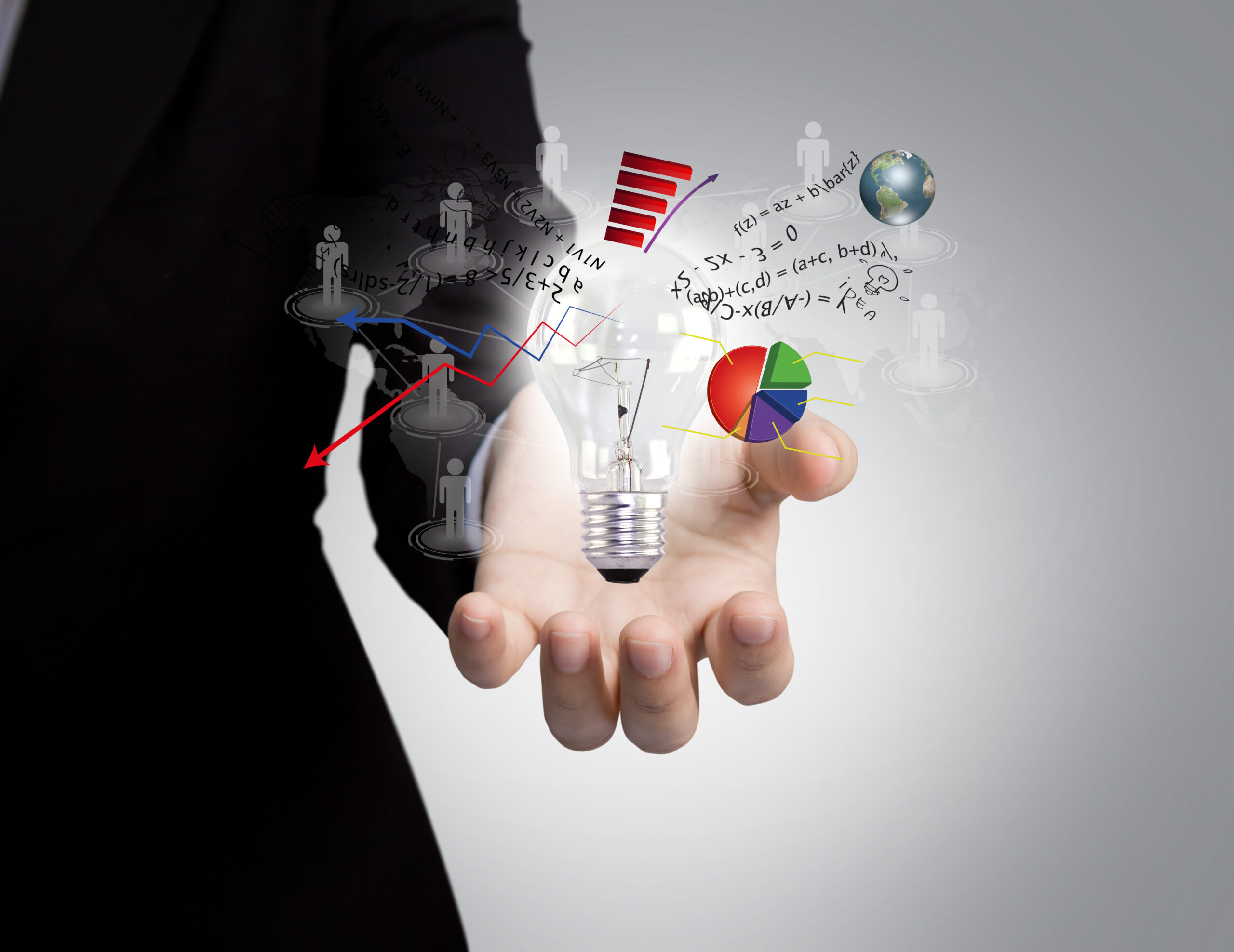 Light bulb in hand with graph out