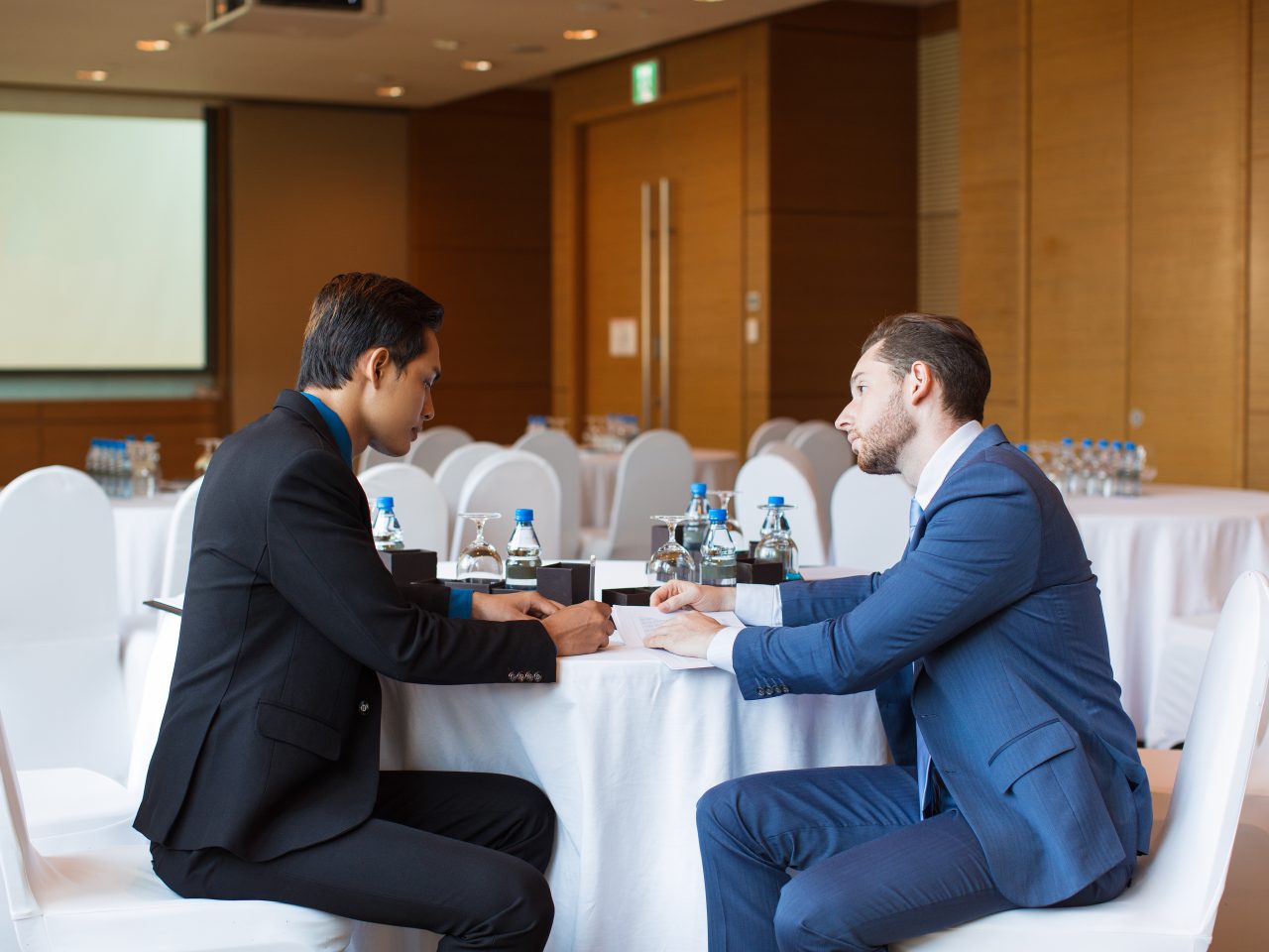 Two Serious Adult Business Men Discussing Issue